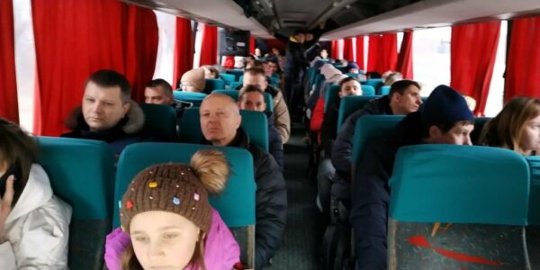 Ukrainians leaving home.