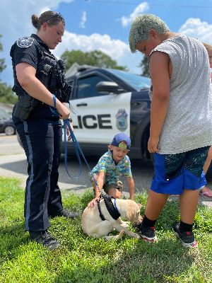 World Share - summer field days - police dog - Global Horizons Inc.