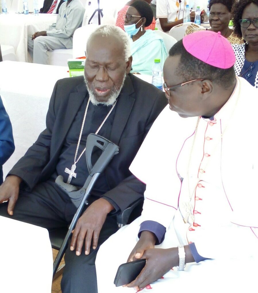 Two Catholic bishops attending the celebration.