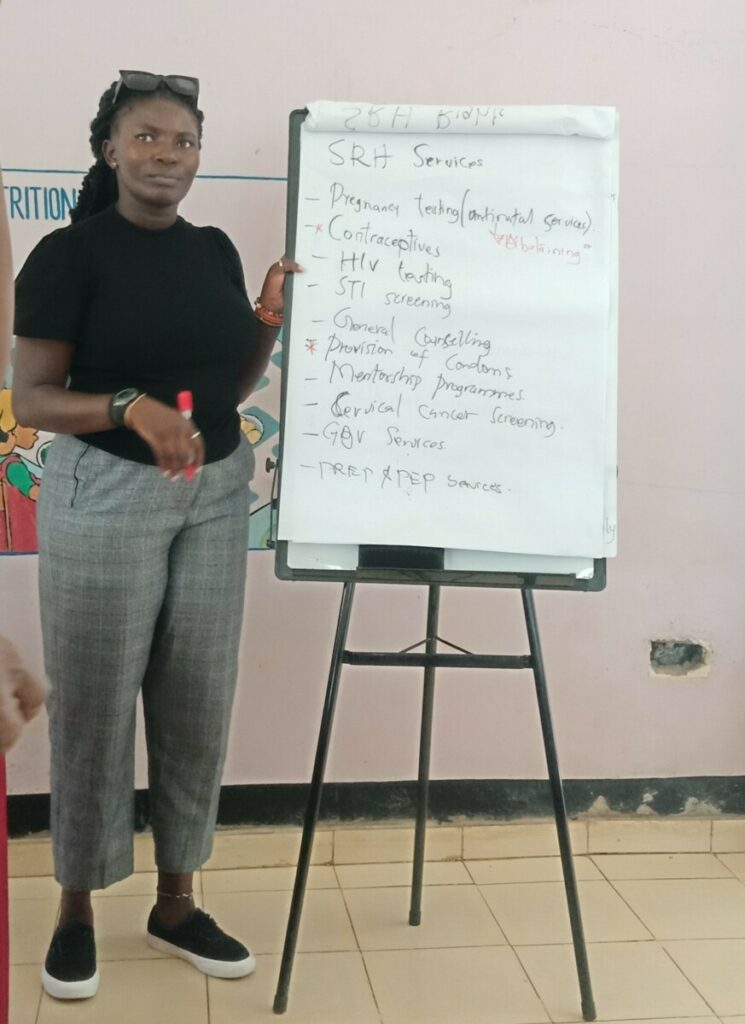 IFAGE facilitator (Ada Okwiri) conducting a facilitation Sexual Reproductive Health Services.