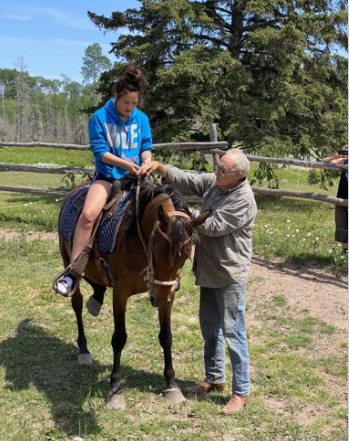 Providing experiences and engaging through horseback riding.
