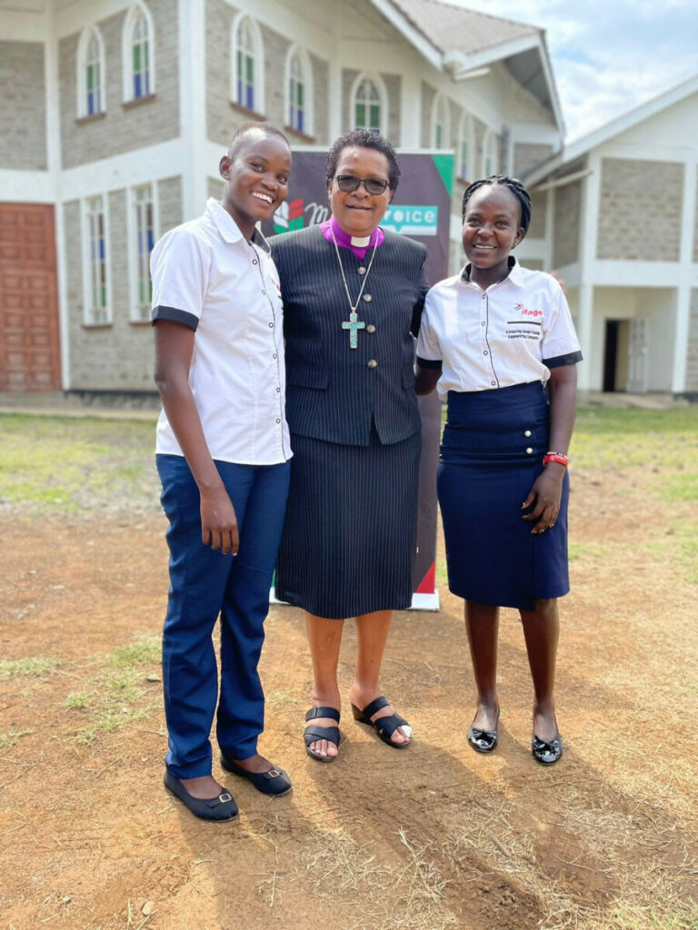 Future IFAGE para-social workers with Bishop Rose Okena, at a collaboration exchange workshop.