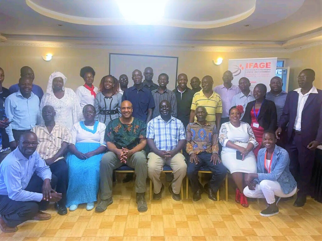 A group photo of priests from Pentecostal churches with IFAGE team at Dotreece Hotel in Bondo during the Christian Leaderships Training with Rev. Prof. Collin Miller (GHI Board Member).