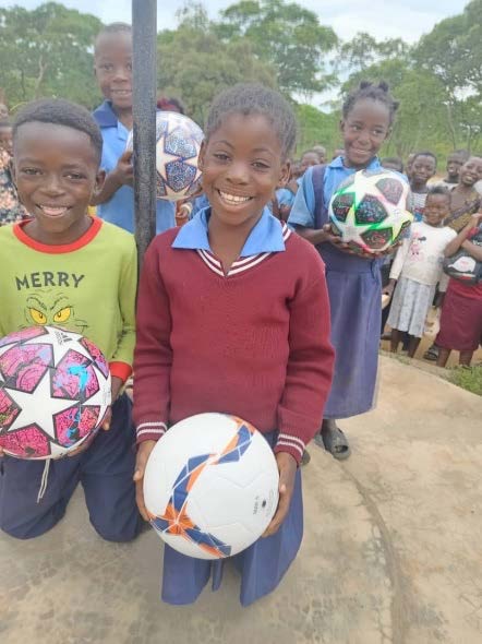 Thanks to the support of our generous donors, each child received a special gift at the end of the school year: a Bible, pair of shoes and candy. New soccer balls were also donated to the school, which brought an extra measure of joy to the students!